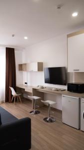 Kuchyň nebo kuchyňský kout v ubytování Hide Apart Hotel