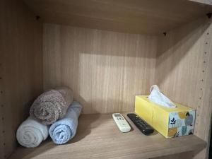 Postel nebo postele na pokoji v ubytování Sangmin suite