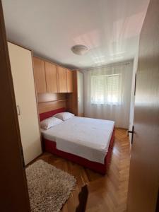 Postel nebo postele na pokoji v ubytování Apartment Vesna