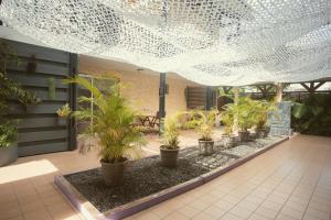 Zahrada ubytování 15 - LE VACOA - CHAMBRE 15 ETG D