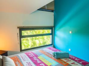 Ένα ή περισσότερα κρεβάτια σε δωμάτιο στο blue lagoon