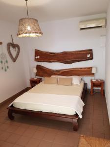 Postel nebo postele na pokoji v ubytování 4 - LE VACOA - CHAMBRE 4 Rdc D
