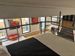 Postel nebo postele na pokoji v ubytování Le Loft du Matheron + 2 fotografie