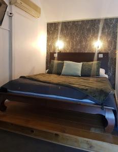 Postel nebo postele na pokoji v ubytování 10- LE VACOA - CHAMBRE 10 ETG G