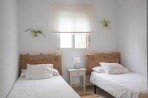 A bed or beds in a room at Mi pequeño rincón
