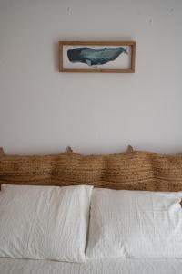 A bed or beds in a room at Mi pequeño rincón Még 7 kép