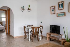 A television and/or entertainment centre at Mi pequeño rincón
