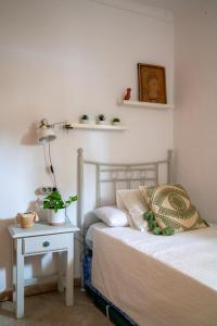 A bed or beds in a room at Mi pequeño rincón