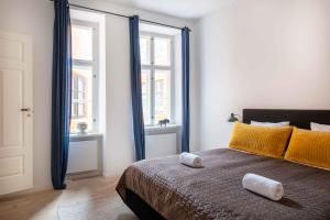 Rúm í herbergi á Charismatic Apartments in Copenhagen Old Town
