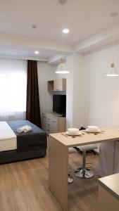 TV a/nebo společenská místnost v ubytování Hide Apart Hotel