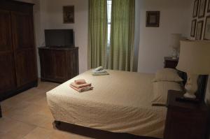 Postel nebo postele na pokoji v ubytování Agriturismo Picchio Rosso