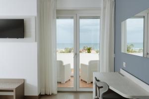 TV o dispositivi per l'intrattenimento presso Hotel Caravel