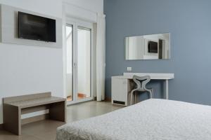 TV o dispositivi per l'intrattenimento presso Hotel Caravel