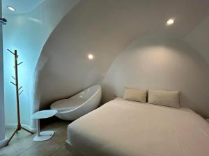 Postel nebo postele na pokoji v ubytování Benyada Lodge - Surin Beach