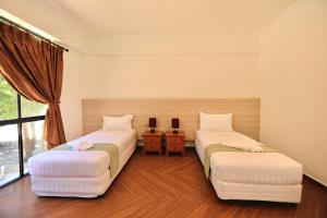 Postel nebo postele na pokoji v ubytování Dolphin Bay Island Resort 海豚岛
