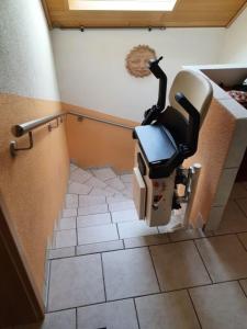 a room with a hair dryer on the wall at Casa Ulla am Hallenbad in Haiger