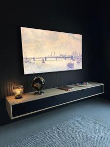 TV a/nebo společenská místnost v ubytování #Lofoten Leilighet ved sjøen