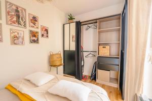 Postel nebo postele na pokoji v ubytování Tiaré