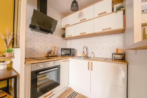 Kuchyň nebo kuchyňský kout v ubytování Tiaré + 5 fotografií