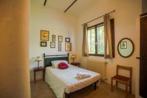 Postel nebo postele na pokoji v ubytování Agriturismo Picchio Rosso