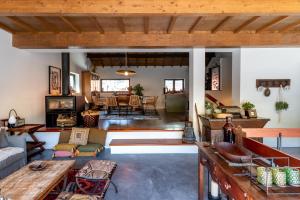 a living room with a couch and a table at Feel Discovery P&P House Douro Valley in Resende