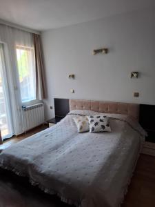 Postel nebo postele na pokoji v ubytování Guest house Skabrin