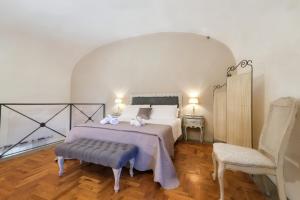 Postel nebo postele na pokoji v ubytování Castellare Loft appartamento in collina a Firenze