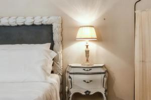Postel nebo postele na pokoji v ubytování Castellare Loft appartamento in collina a Firenze