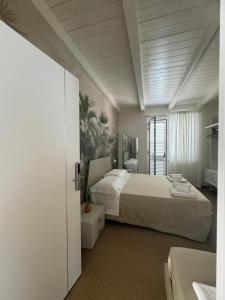 Postel nebo postele na pokoji v ubytování Rupella b&b