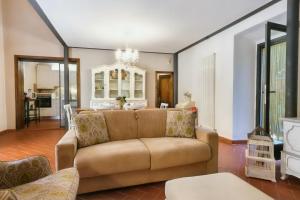 Posezení v ubytování Castellare Loft appartamento in collina a Firenze