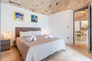 Posteľ alebo postele v izbe v ubytovaní Relais I Secolari