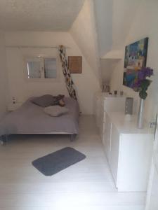 Ένα ή περισσότερα κρεβάτια σε δωμάτιο στο Pavillon Val