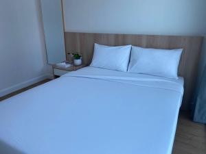 Postel nebo postele na pokoji v ubytování Prime Sleep by Miracle - Booked on Hourly Basis