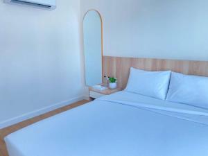 Postel nebo postele na pokoji v ubytování Prime Sleep by Miracle - Booked on Hourly Basis