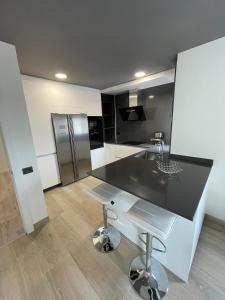 Una cocina o zona de cocina en Hogar Ribeiriña Ribeira
