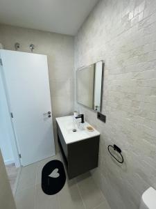 Un baño de Hogar Ribeiriña Ribeira