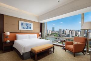Cama ou camas em um quarto em Shangri-La Chengdu
