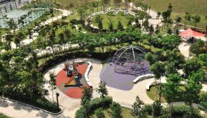an overhead view of a park with a roller coaster at Nilai H2 in Nilai