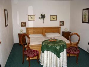 Postel nebo postele na pokoji v ubytování Villa Olivia