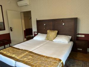 Postel nebo postele na pokoji v ubytování Hotel Boshof