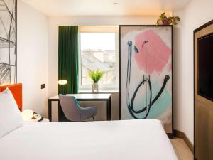 Postel nebo postele na pokoji v ubytování ibis Styles Edinburgh St Andrew Square