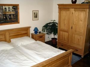Tempat tidur dalam kamar di Villa Olivia