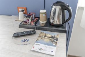 Príslušenstvo na prípravu kávy alebo čaju v ubytovaní Hotel Italia