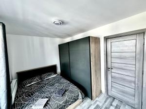Postel nebo postele na pokoji v ubytování Apartament Premium