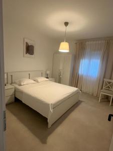 Postel nebo postele na pokoji v ubytování Guesthouse Davorka Bijelić