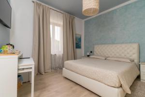 Posteľ alebo postele v izbe v ubytovaní Rosmary42 Miralago