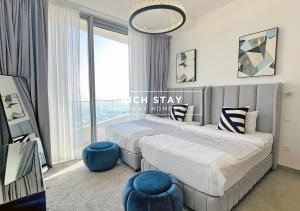 Postel nebo postele na pokoji v ubytování Splendid 3BR in Stella Maris,Sea View,Dubai Marina + 30 fotografií