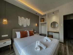 Postel nebo postele na pokoji v ubytování Hotel Eleni