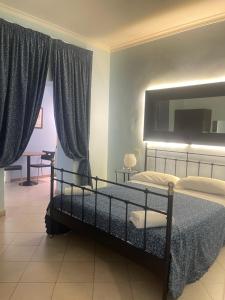 Posteľ alebo postele v izbe v ubytovaní Residence Lodi