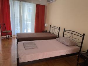 Postel nebo postele na pokoji v ubytování Petaluda House 5